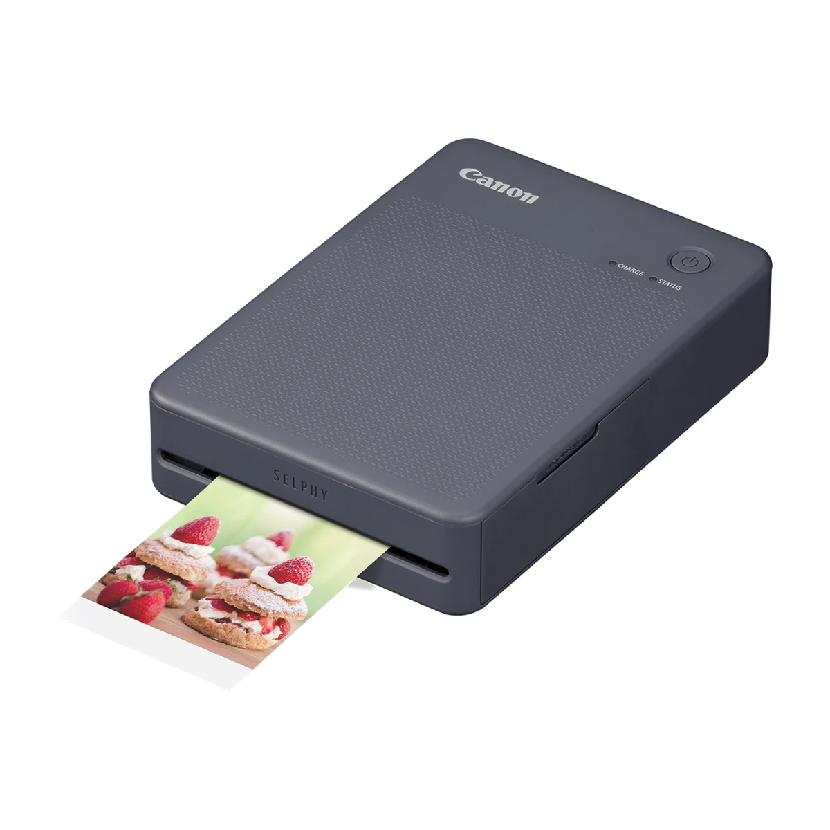 Canon SELPHY QX20 dark gray, angled view with print Canon SELPHY QX20 dark gray, angled view with print